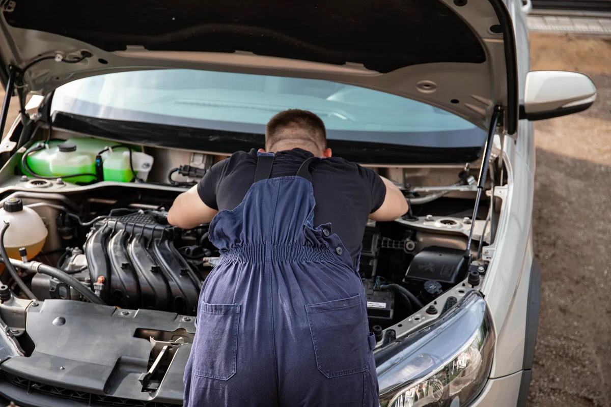 Mechanic at work on an engine